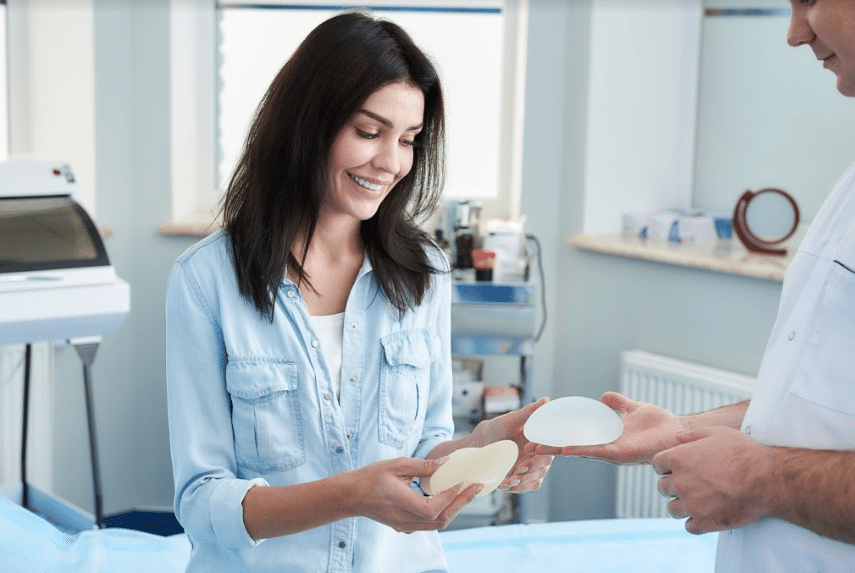 female patient at a breast augmentation consultation